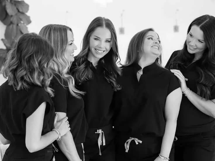 A clinical team of five: clinician, nurse, health coach and nutritionist working together